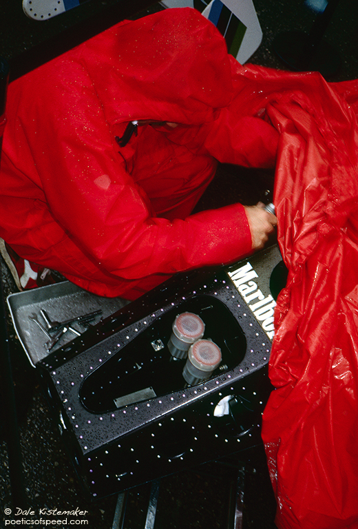 mclaren.mechanic.tarp.rain.mon84.sign