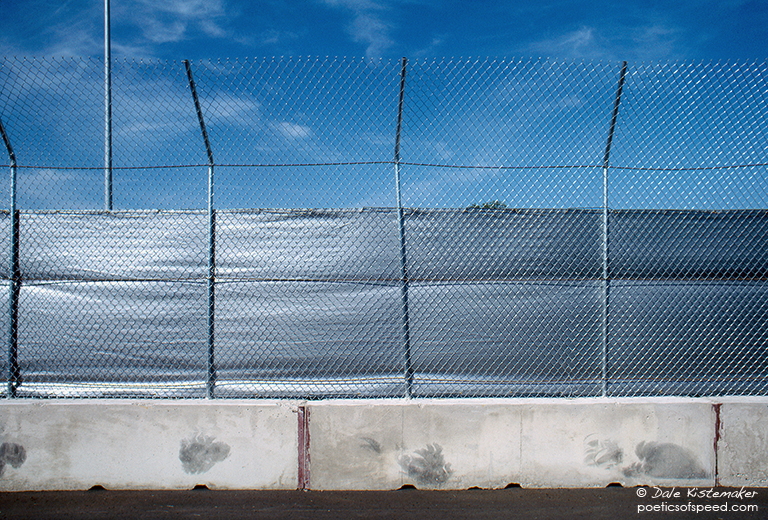 tiremarks.wall.fence.dal84sign